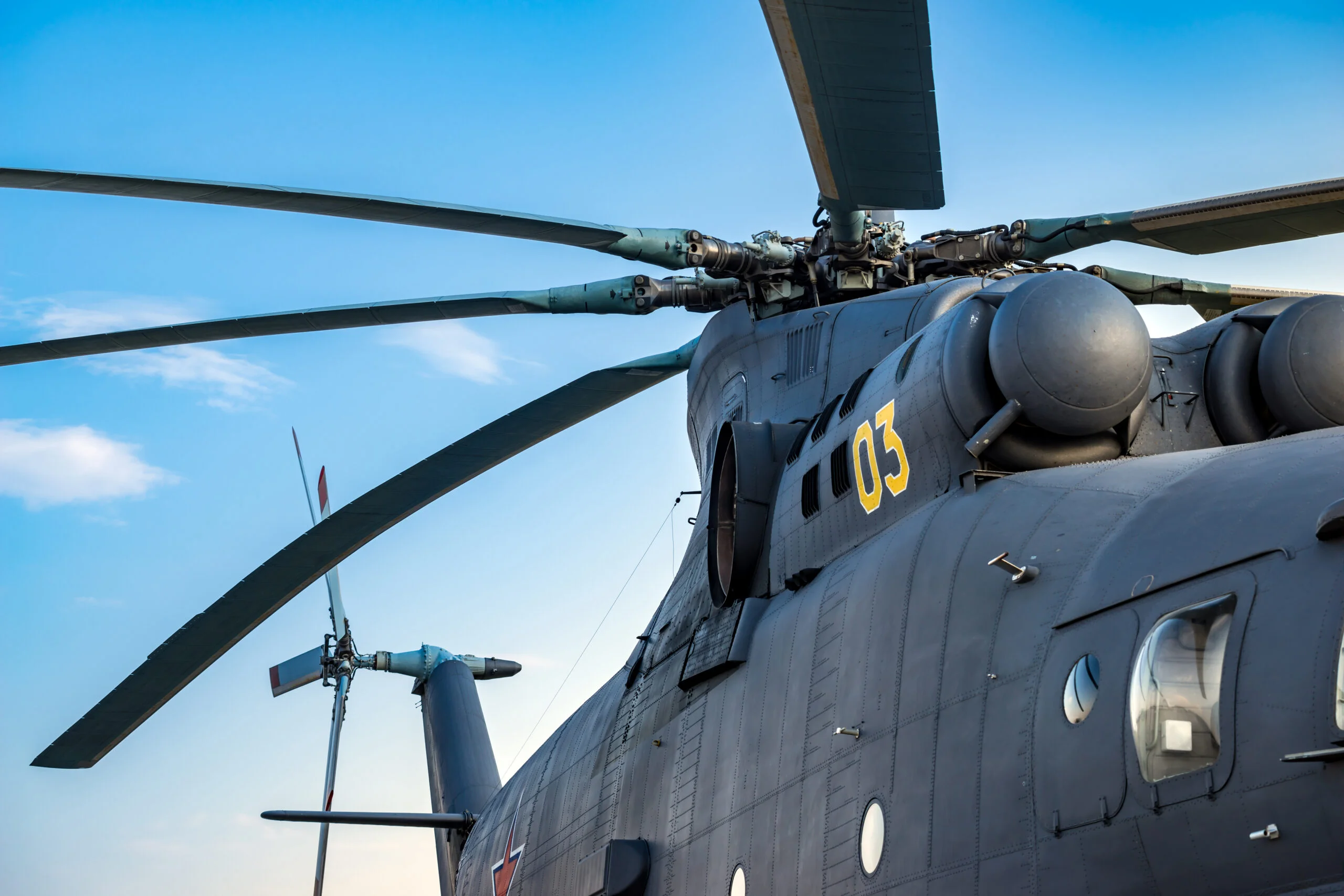 Military heavy helicopter army air means of transport air force aviation and aerospace industry dark gray big copter with rotor - Fictiv military helicopter rotor hub and blades need precise manufacturing